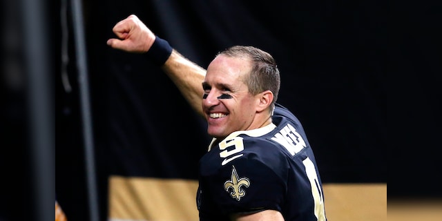 New Orleans Saints quarterback Drew Brees (9) reacts as he runs off the field after defeating the Carolina Panthers in a NFL football game in New Orleans, Sunday, Oct. 25, 2020. The Saints won 27-24. (AP Photo/Butch Dill)