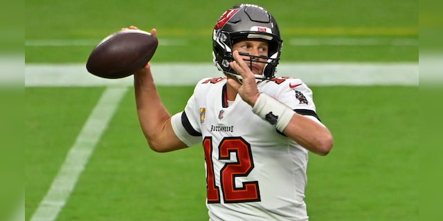 Tampa Bay Buccaneers quarterback Tom Brady (12) throws against the Las Vegas Raiders during the first half of an NFL football game, Sunday, Oct. 25, 2020, in Las Vegas. (AP Photo/David Becker)