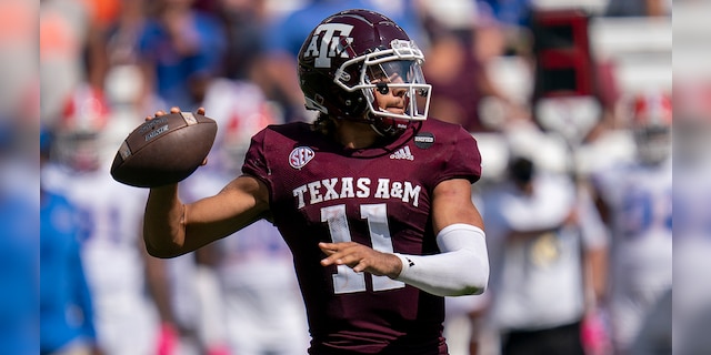 Texas A&M quarterback Kellen Mond (11) passes down field against Florida during the second half of an NCAA college football game, Saturday, Oct. 10, 2020. in College Station, Texas. (AP Photo/Sam Craft)