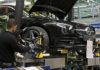 France, Germany and Italy plunge into recession Slowdown: A worker fits wheels to a Mercedes car on the production line in Rastatt, Germany. The eurozone economy as a whole shrank by a 3.8 per cent in the first quarter